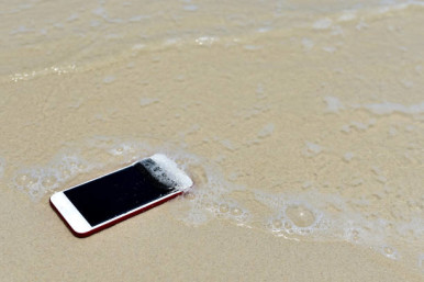Lost Phone.Phone fell Disappear at beach for background